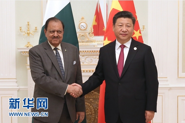 6月23日，國家主席習近平在塔什干會見巴基斯坦總統(tǒng)侯賽因。新華社記者馬占成攝