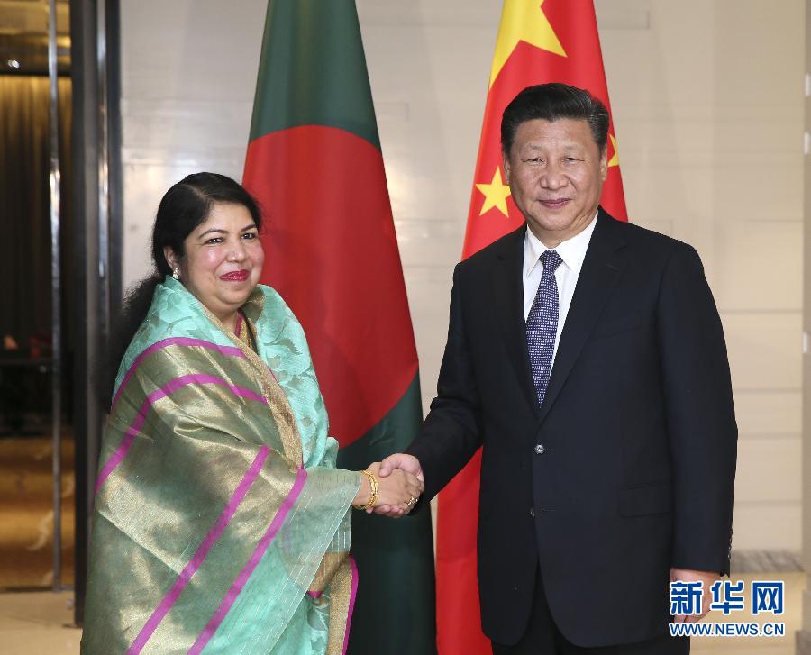 10月14日，國家主席習(xí)近平在達卡會見孟加拉國國民議會議長喬杜里。 新華社記者蘭紅光攝 