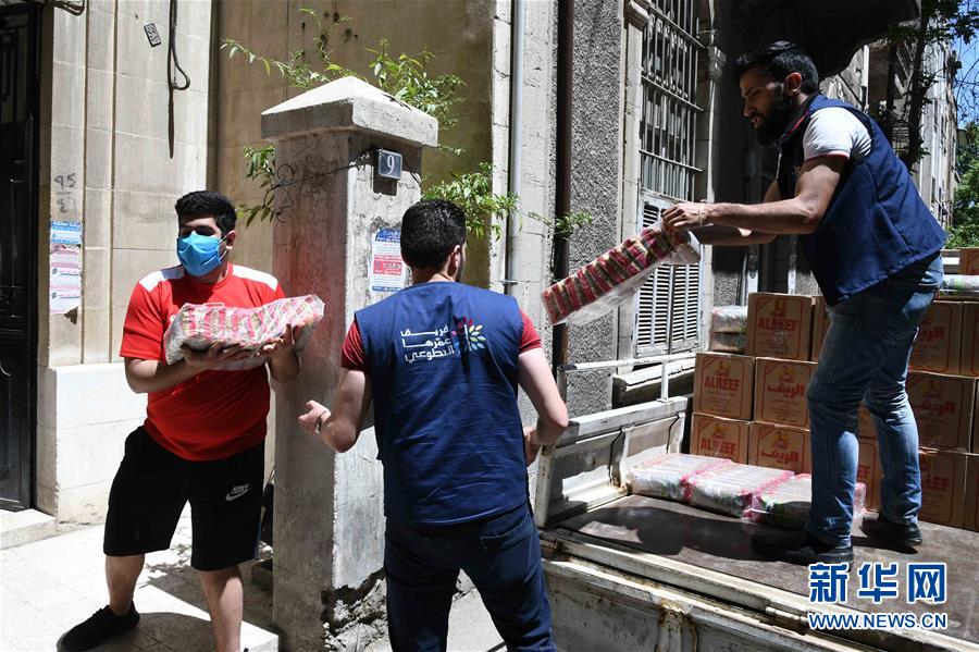 （國(guó)際疫情&middot;圖文互動(dòng)）（2）通訊：疫情中，那抹笑容最難忘&mdash;&mdash;記向困難家庭發(fā)放愛心包裹的敘利亞青年志愿者